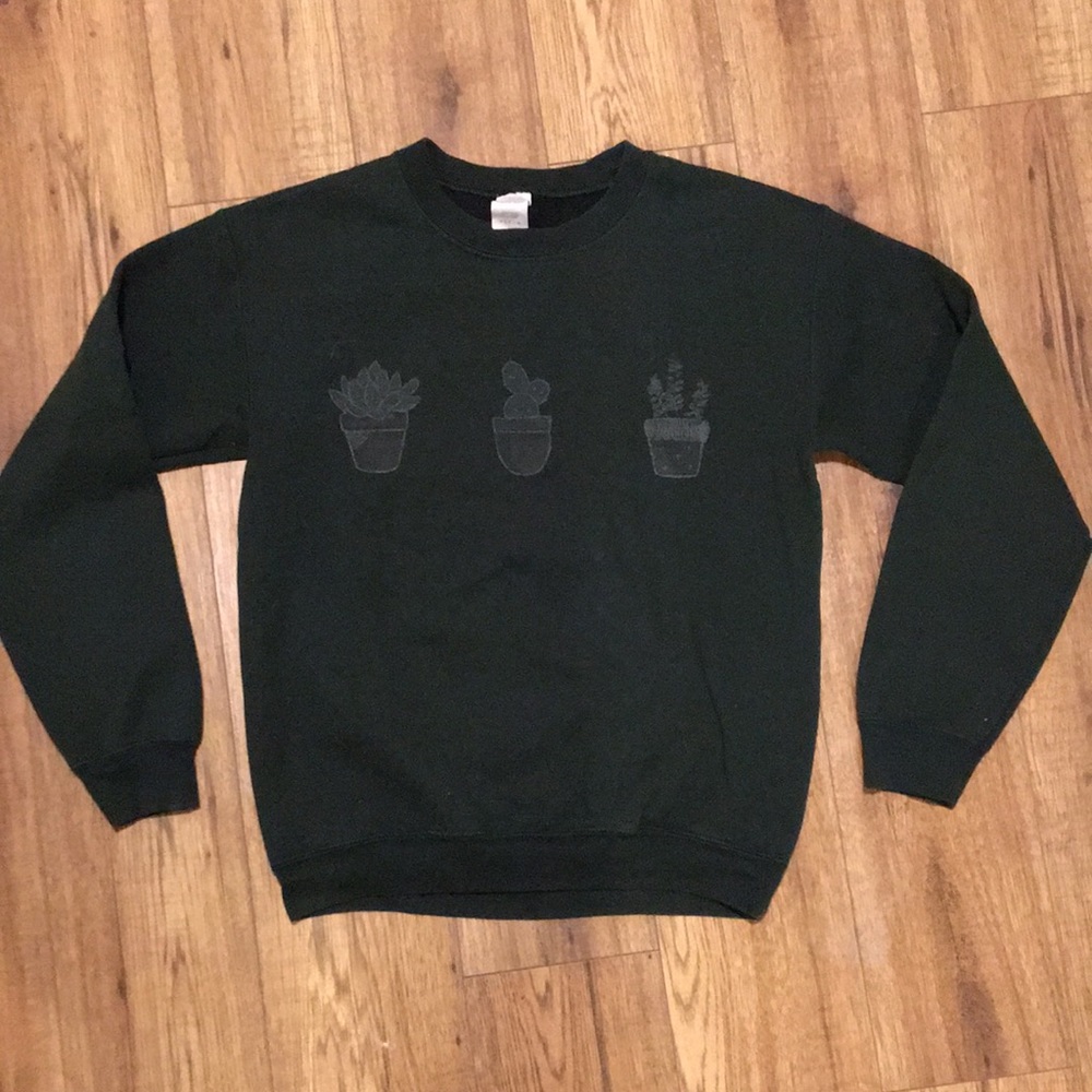 Green Sweater with Plant Design